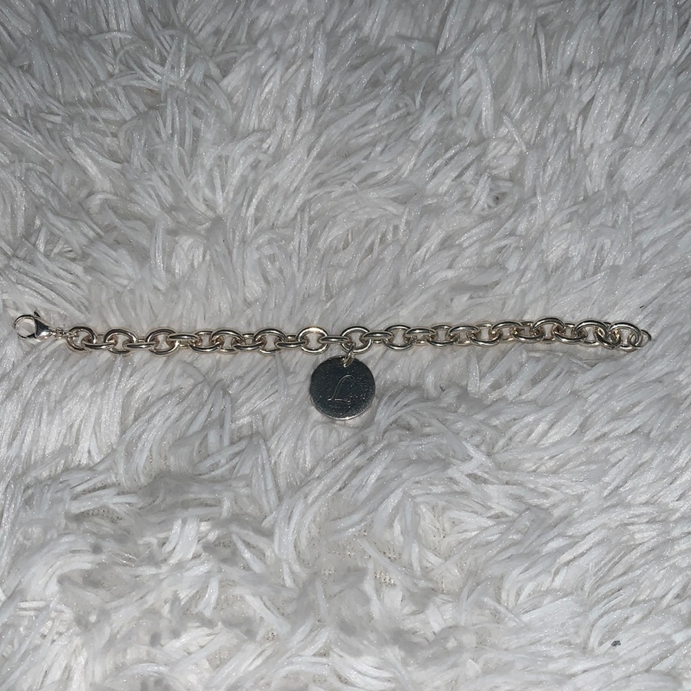 Silver tone initial bracelet